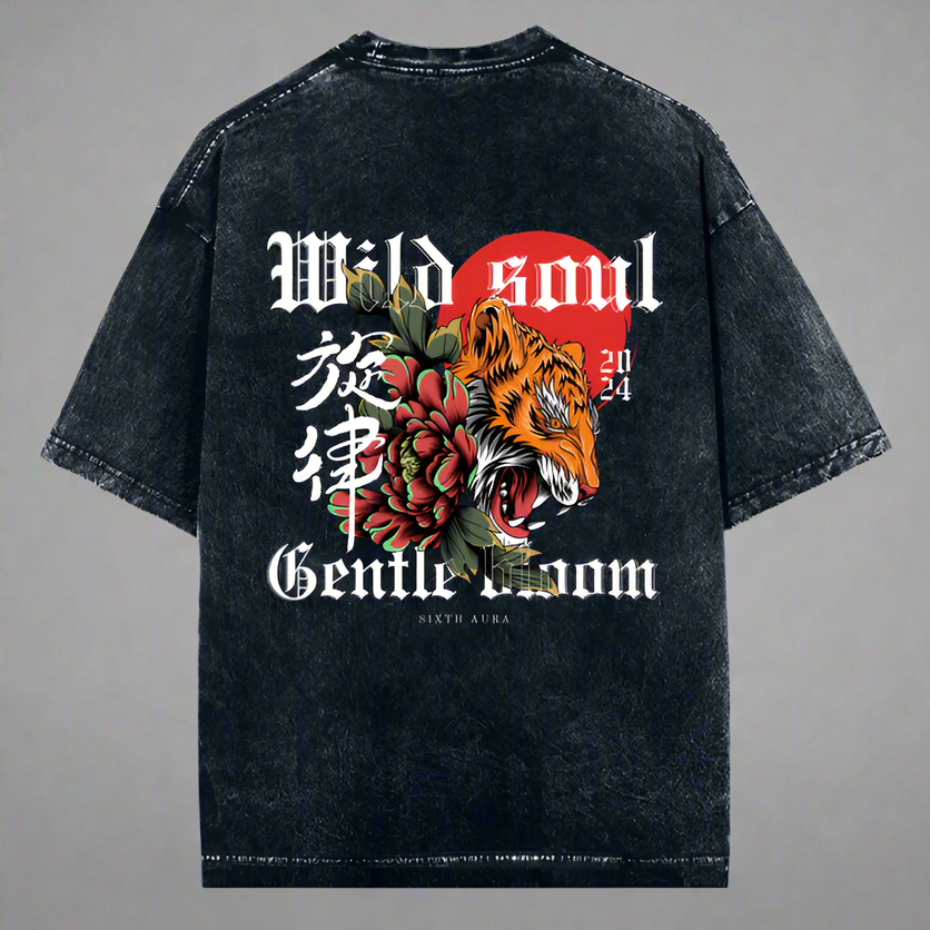 A black oversized t-shirt with text and a graphic design featuring a tiger and a floral pattern on the front.